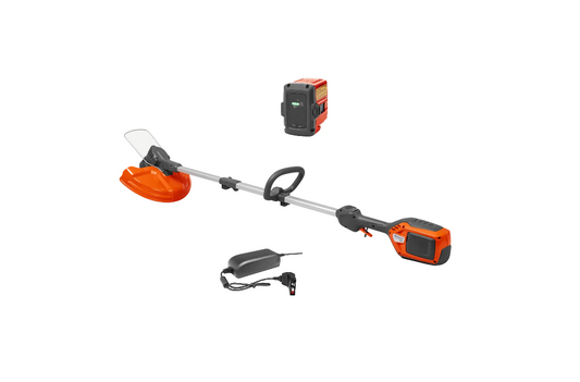 Coupe bordure à batterie Husqvarna 215iL pack avec batterie BLi10 + chargeur QC80